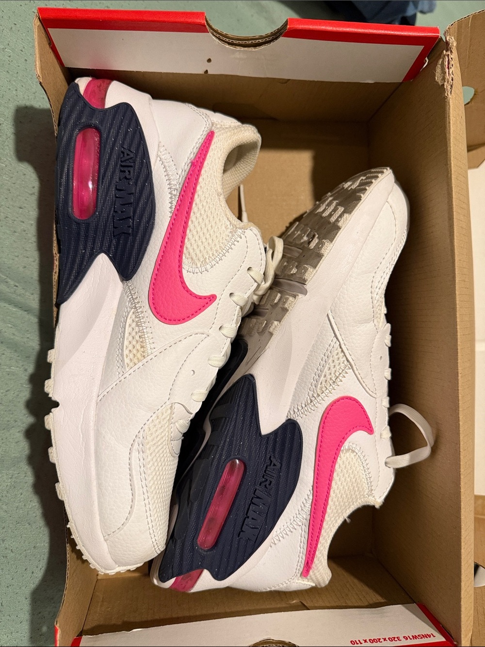 Women’s Nike White Sneakers with Pink Swoosh and Navy Accents